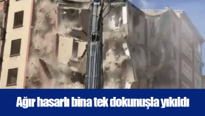 Ağır hasarlı bina tek dokunuşla yıkıldı